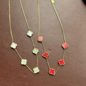Elegant Gold and Red Clover Necklace